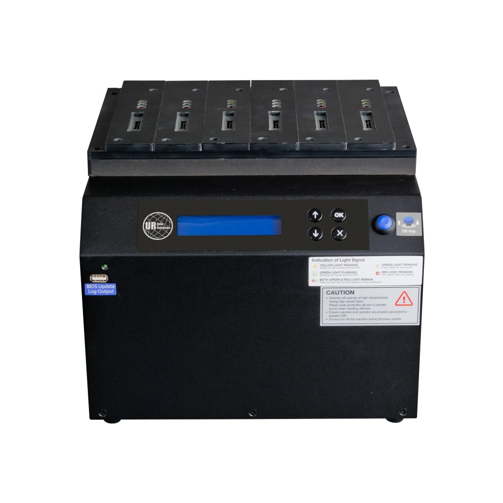 The NV-BM GT11 Series GETAC V110 NIST/DoD Duplicator and Sanitizer is a black electronic device with a digital display, buttons, top item slots, caution labels, and a front panel indicator light.