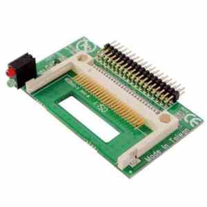 The U-Reach CF socket module features a green PCB, gold pins, red and green LEDs, a white connector slot, and a row of metal pins. Made in Taiwan is printed on one edge, reflecting U-Reach quality assurance.
